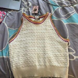 Creamish Tank top with a colorful outline.